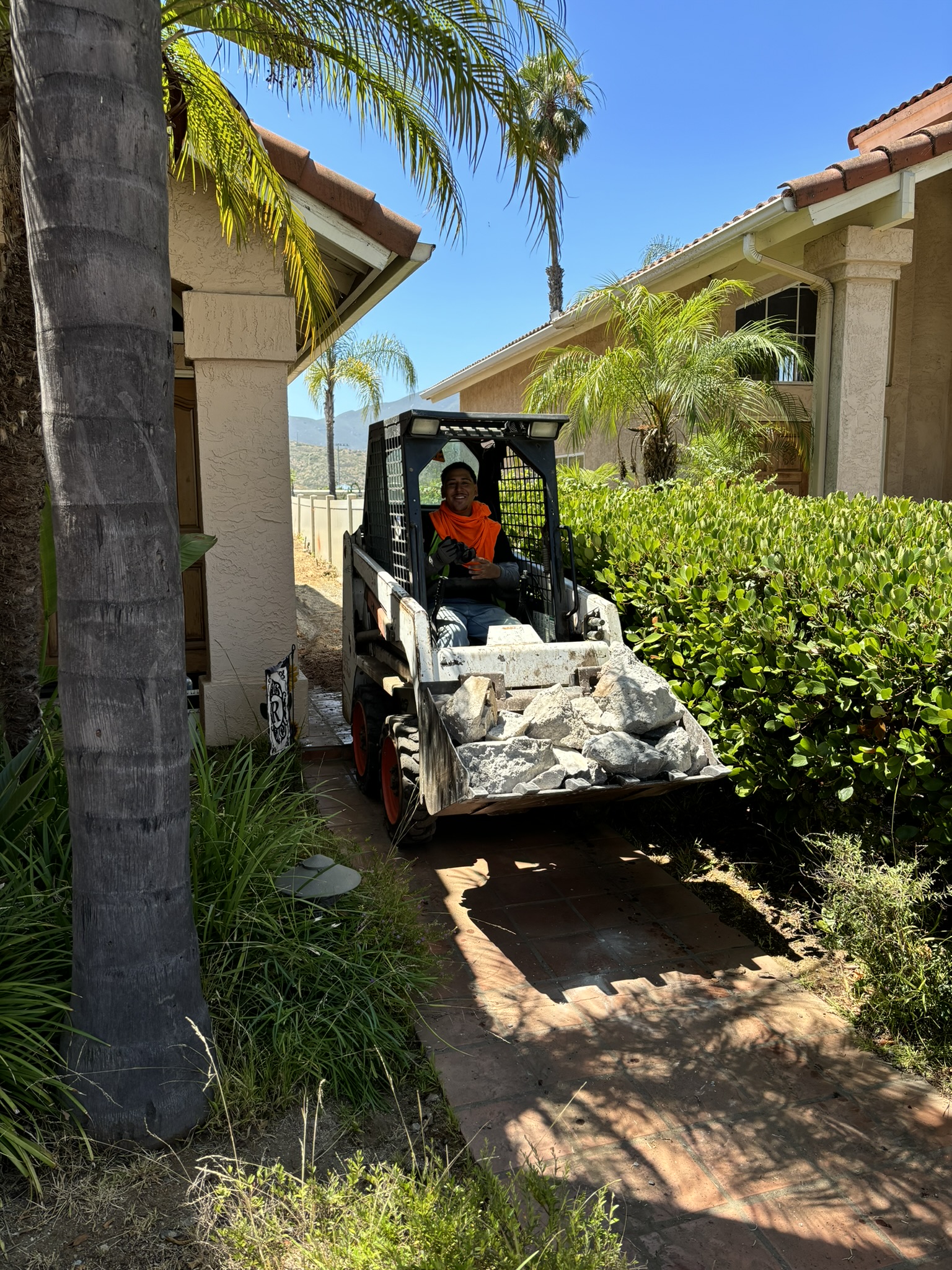 large dumpster filled with commercial demolition debris and materials